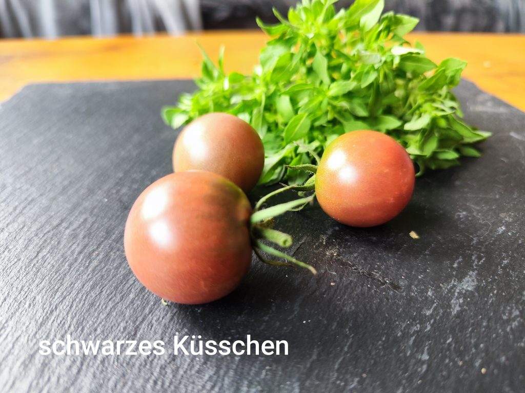 schwarzes Küsschen